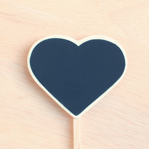 Heart Shape Blackboard on Wood with Retro Filter Effect